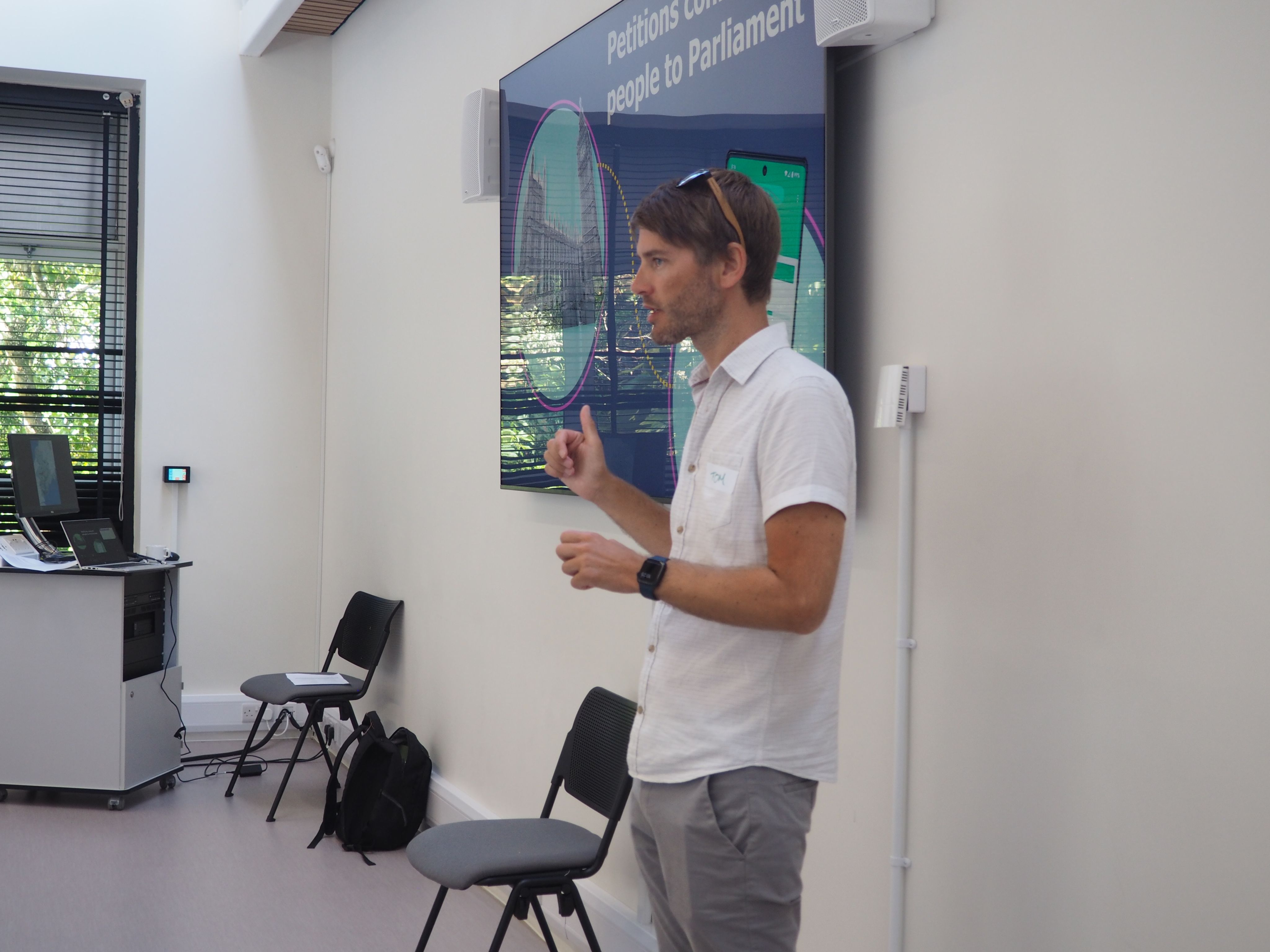 Image of an Outreach officer leading a session at an MP Summer School