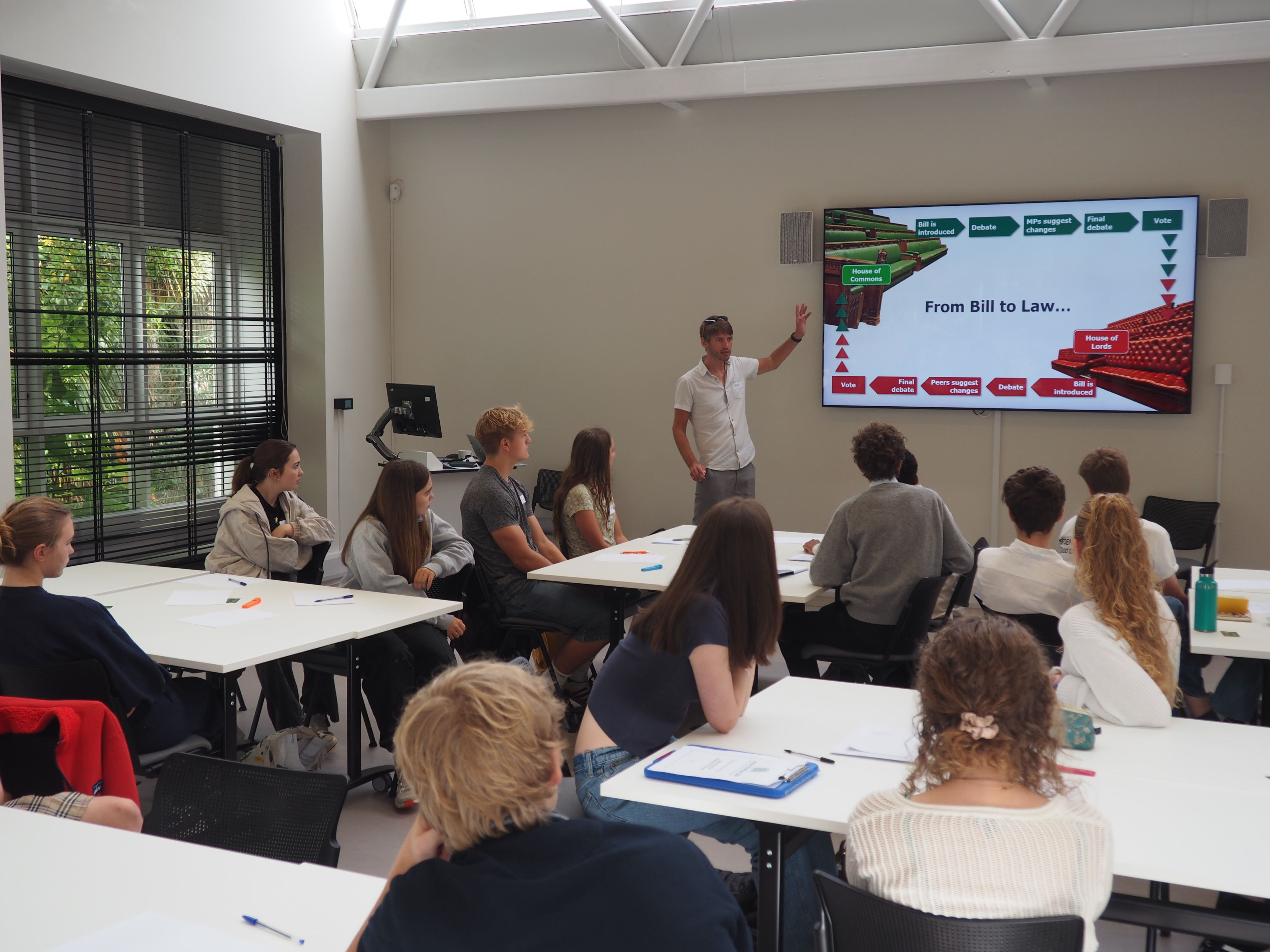 Image of an Outreach officer leading a session at an MP Summer School