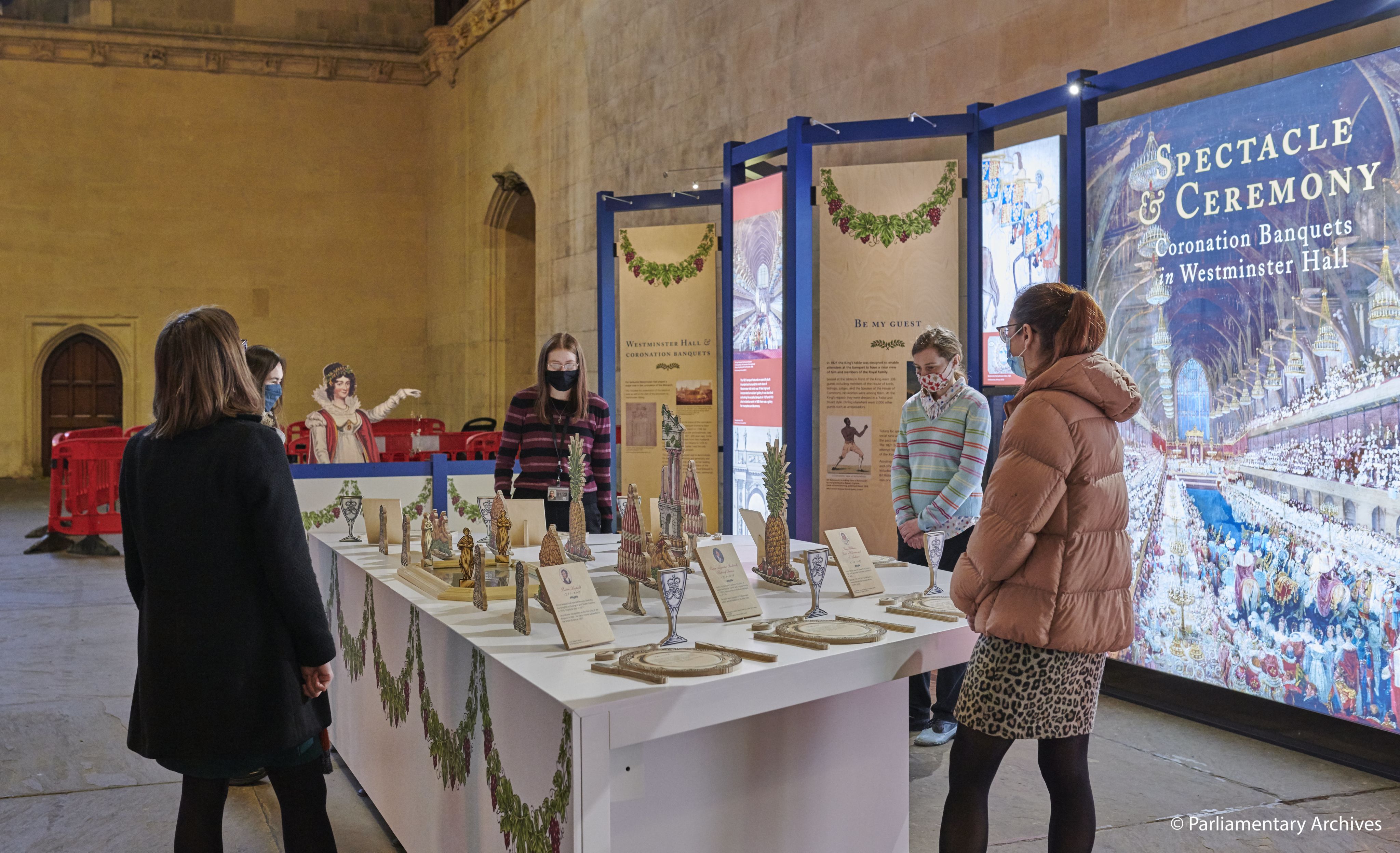 People looking at an exhibition