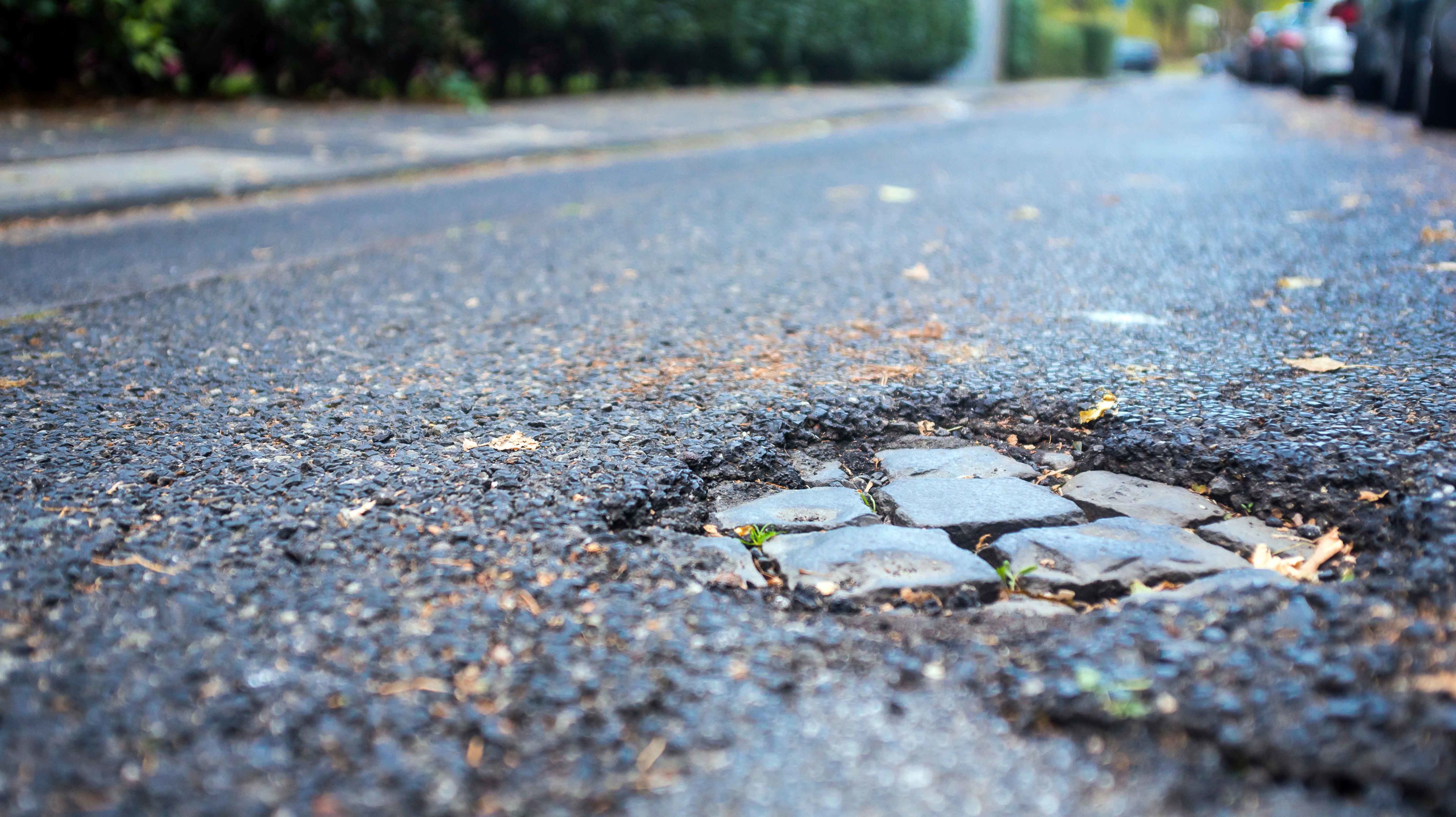 Potholes in the road