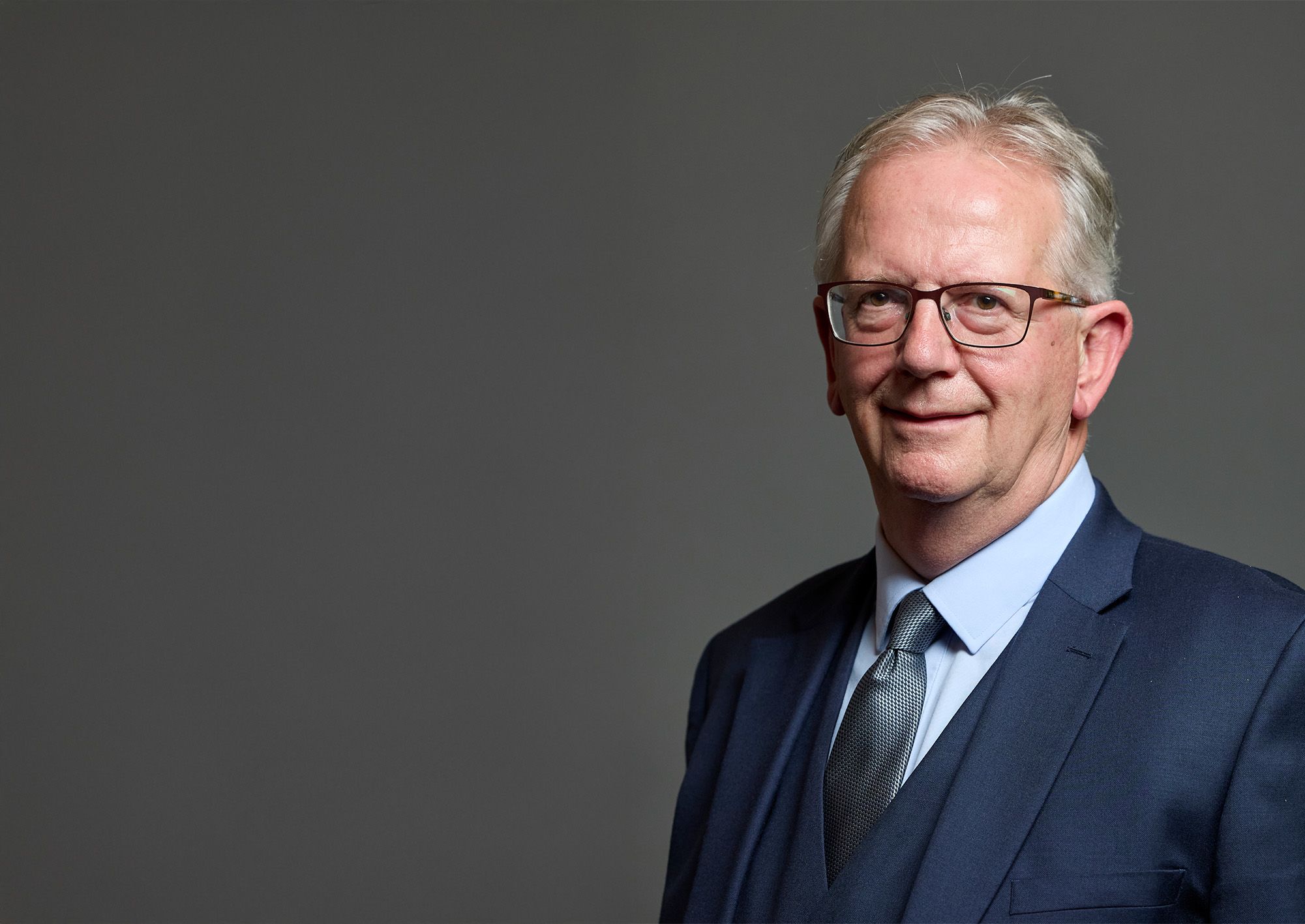 Portrait of Seamus Logan MP