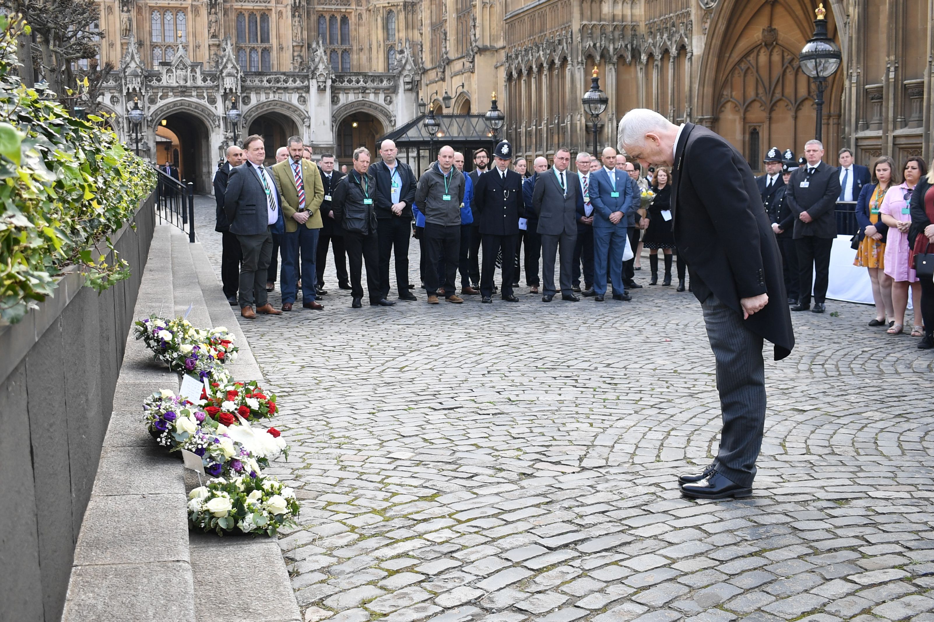 Speaker lays a wreath