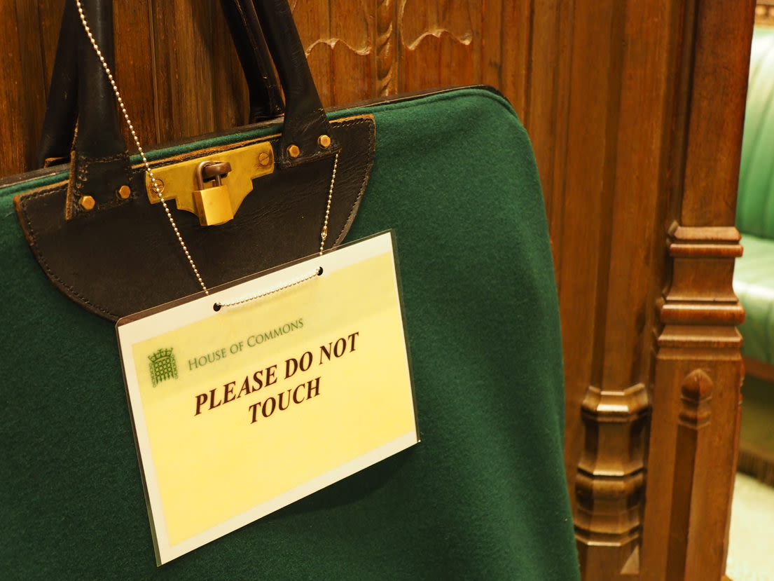  An image of the Petitions Bag. All petitions, whether presented formally or informally in the Commons Chamber, are placed in a green bag that hangs behind the Speaker's Chair.