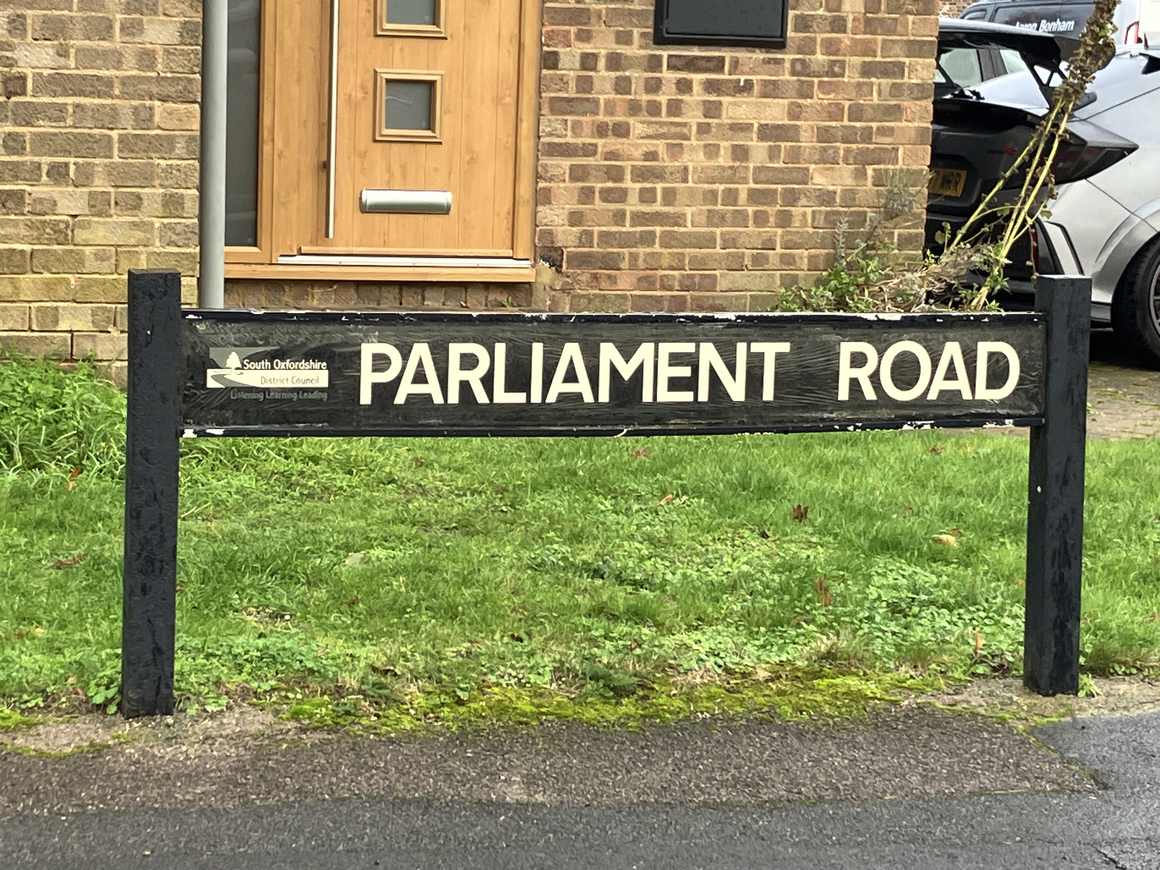 A street sign called "Parliament Road"
