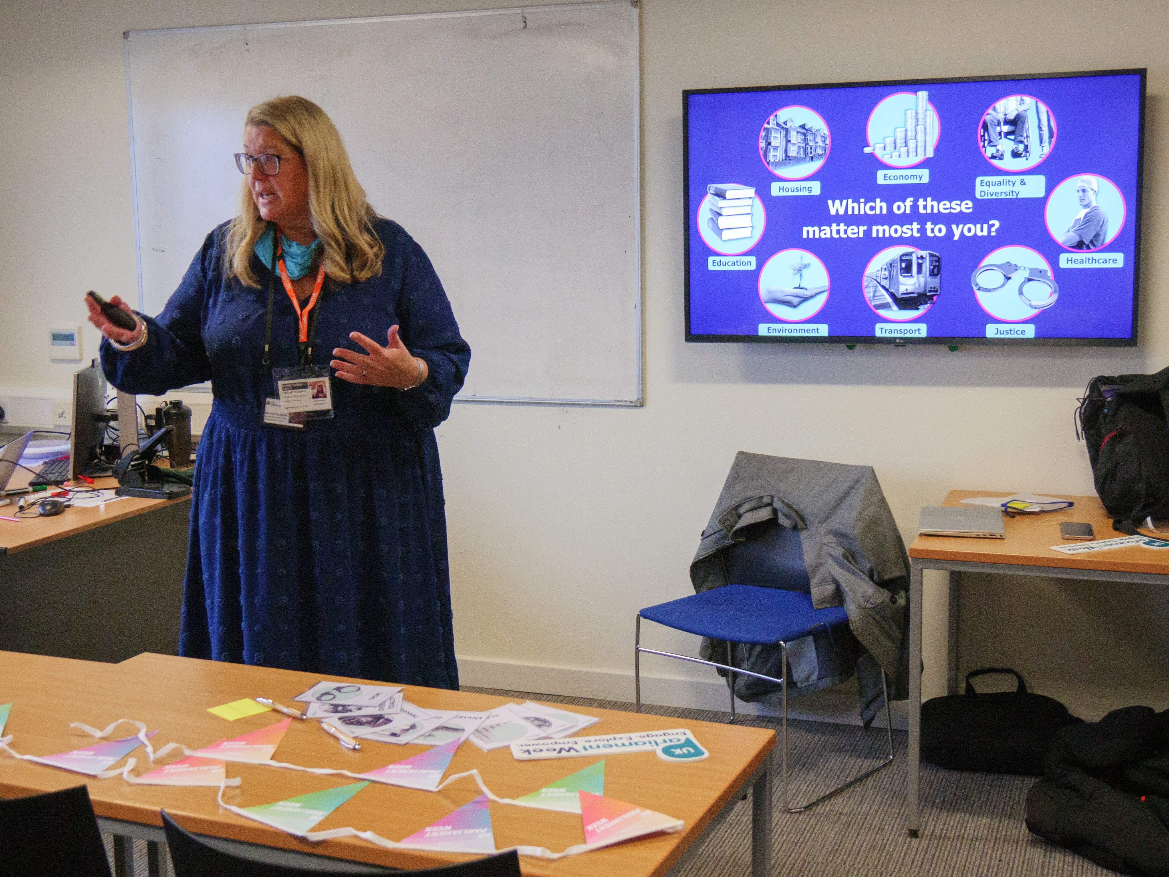A photograph of the North West officer delivering a session to a college
