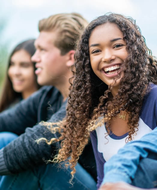 Picture of college students sitting outside