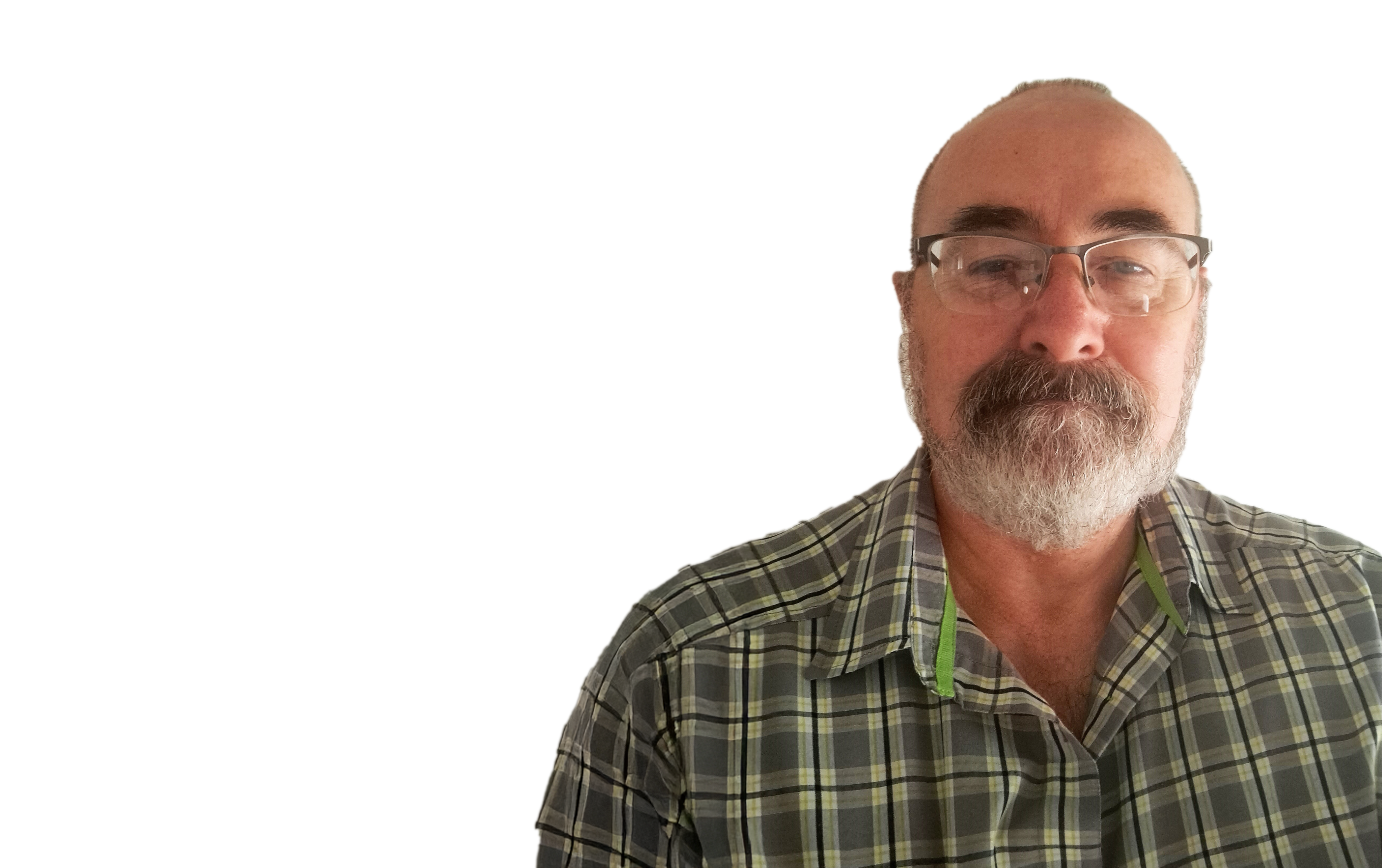 White man with short white beard wearing glasses and checkered shirt.